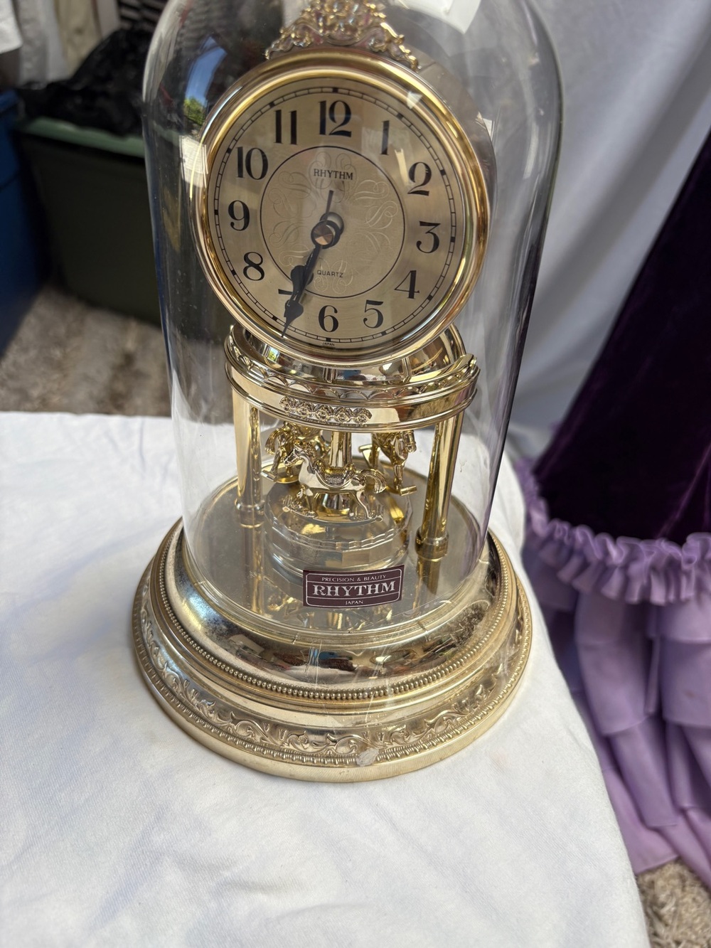 Rhythm Gold Dome Anniversary Clock with Rotating Pendulum